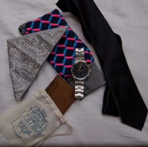 groom wedding accessories flat lay